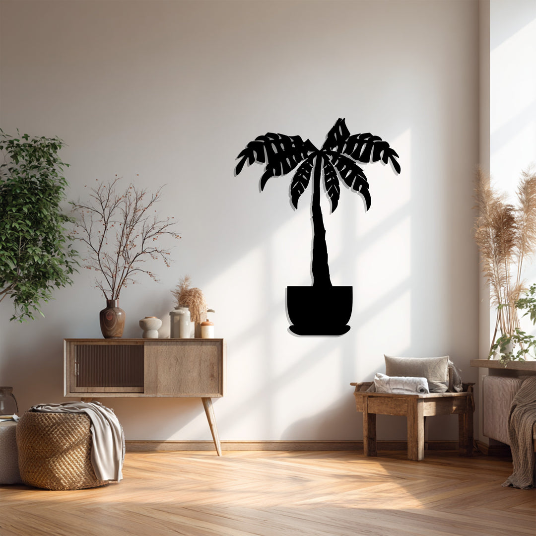 Showcasing the organic forms, this unique metal wall art depicts a tropical palm tree, a modern botanical wall decor with elegant, flowing lines.