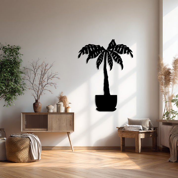 Showcasing the organic forms, this unique metal wall art depicts a tropical palm tree, a modern botanical wall decor with elegant, flowing lines.
