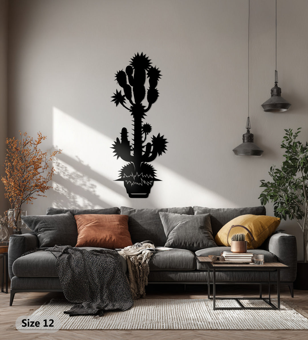 Foreground shows a living room rug in front of a couch, adding depth to the decorative metal art, a spiky desert cactus, on the wall behind.