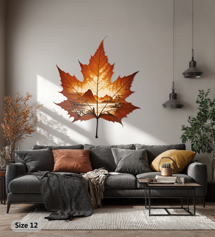 Featuring the abstract quality of a maple leaf shaped decorative metal art piece, the autumn horizon is uniquely rendered in this nature landscape wall decor.