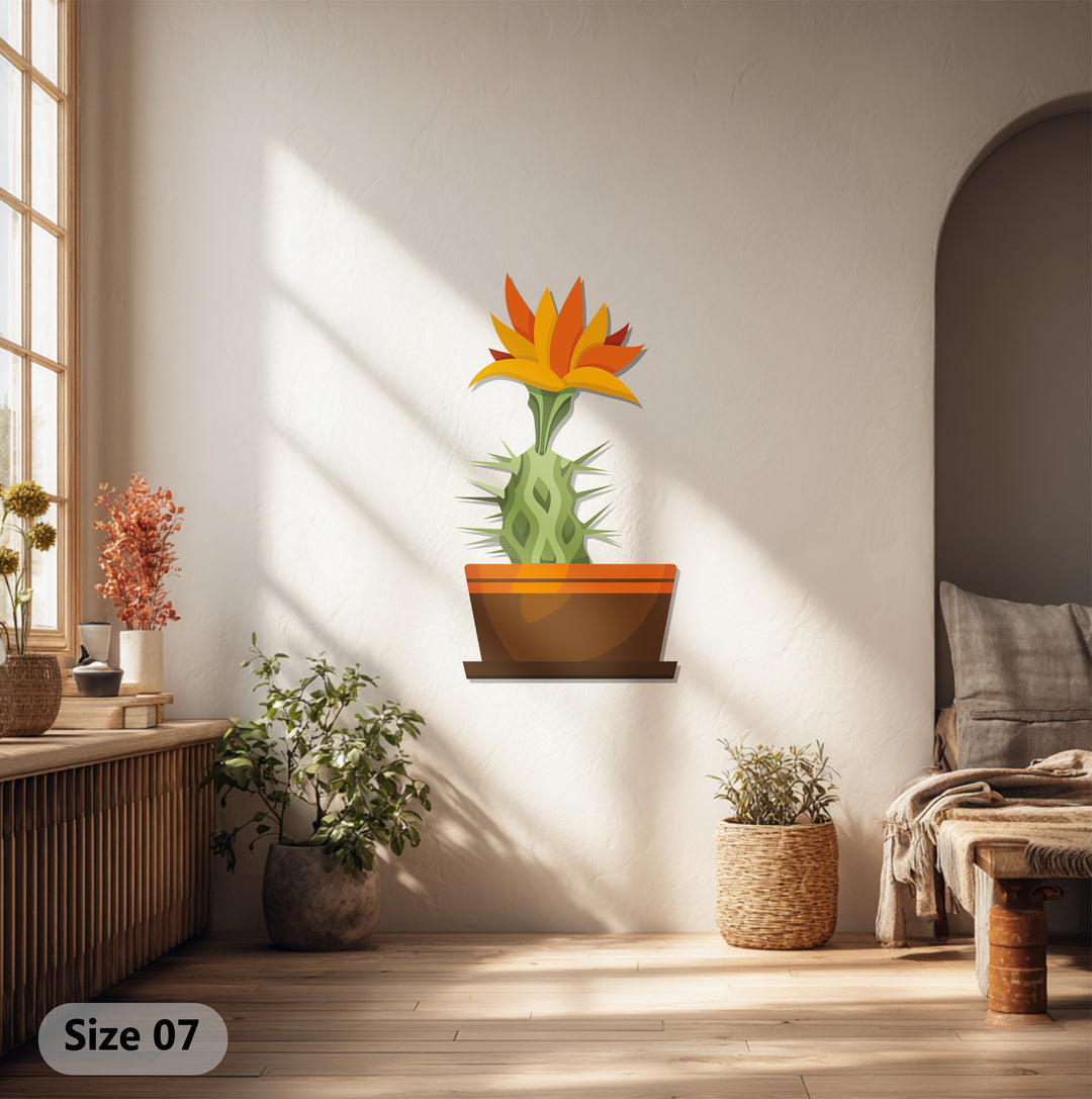Sunlit white walls and warm wood flooring provide a neutral backdrop for this cactus bloom, enhancing the modern botanical metal wall decor.