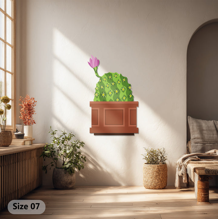 Sunlit hardwood floors accentuate the botanical modern wall decor of this pink bloom cactus metal art for wall, displayed in a neutral room.