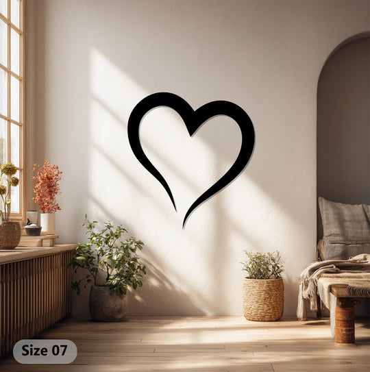 Highlighting the abstract quality, this minimal heart outline metal art's fluid, dark lines offer a modern metal art for wall piece that elevates any space.
