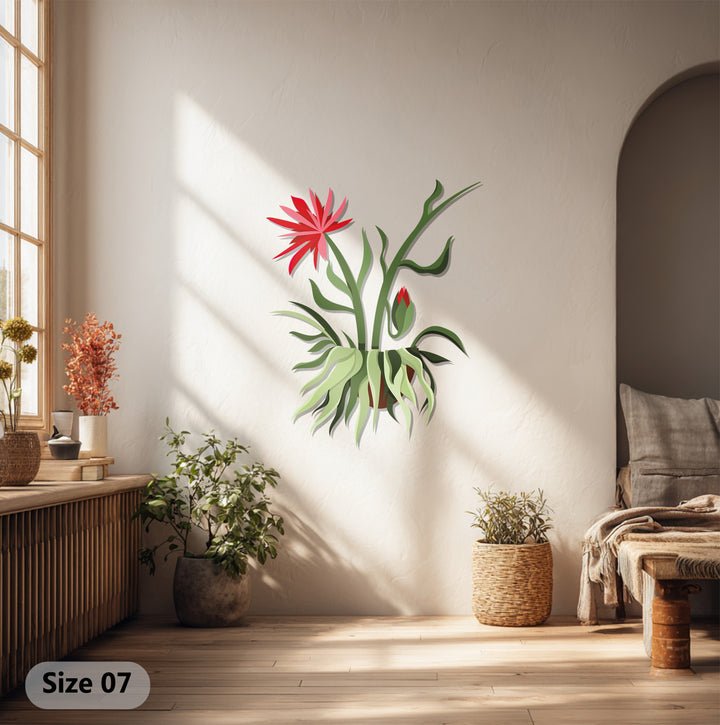 Minimalist presentation highlights the subtle decoration wall art of a red bloom hanging plant crafted from metal, emphasizing the interplay of shapes created by negative space.