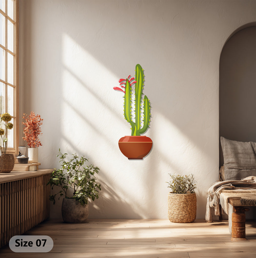 Observing the transition between colors in the twin column cactus metal artwork, the green hues blend seamlessly with the reddish-brown pot in this unique metal artwork.