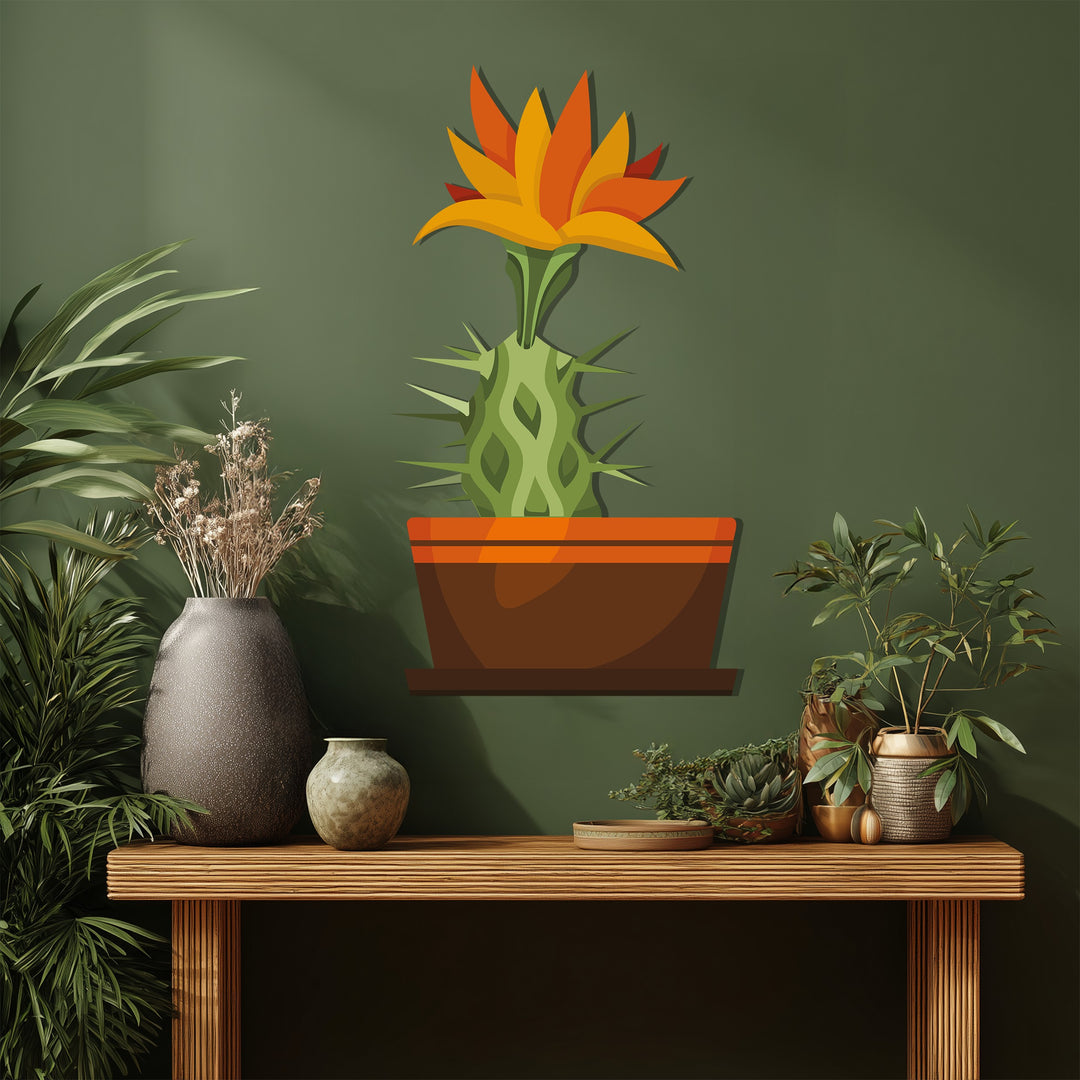 Featuring high color saturation, the decorative metal art shows a vibrant Sunrise Cactus Bloom, a modern botanical wall decor piece with vivid orange and yellow hues.