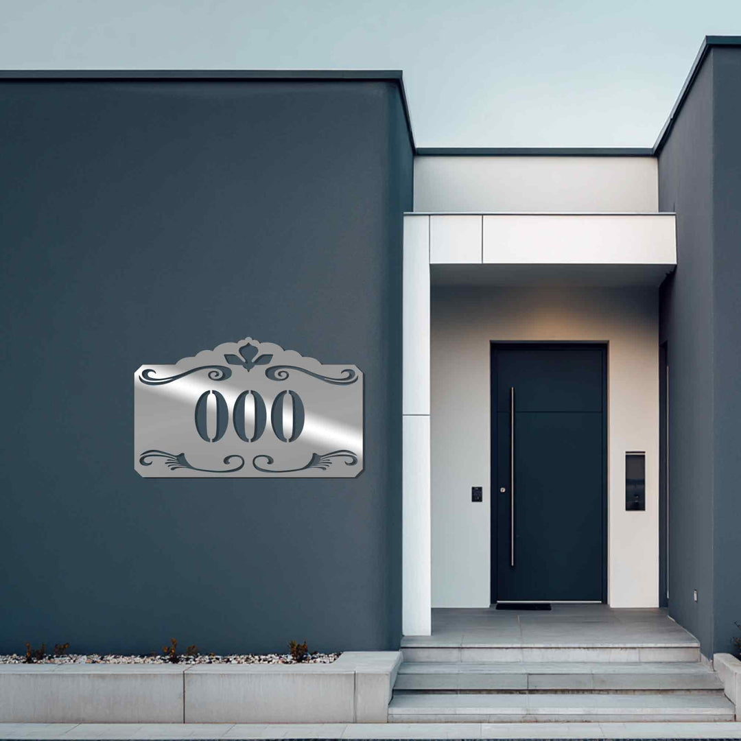 Decorative vintage metal house number sign