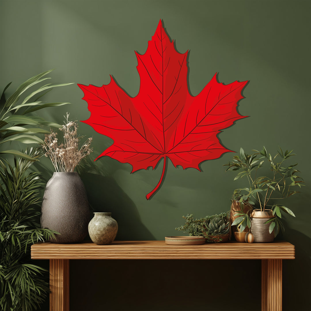 Highlighted by the brightness, a red maple leaf metal artwork brings nature-inspired home decoration to this stylish, shadowed interior scene.