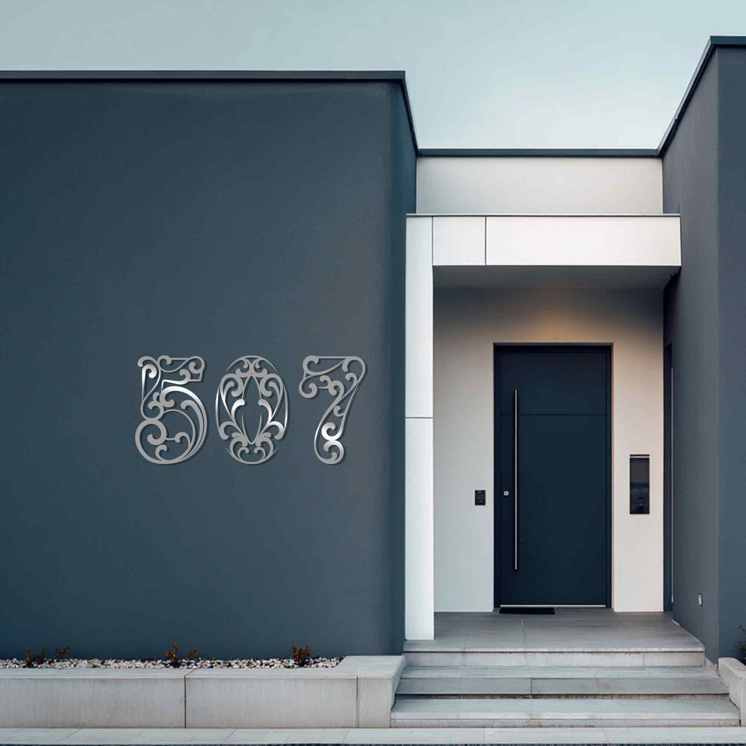Black ornate metal house number wall decor