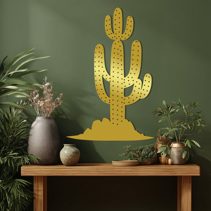 Botanical softness contrasts with the bold unique metal wall art of a saguaro cactus, a modern desert landscape wall decor accent piece.