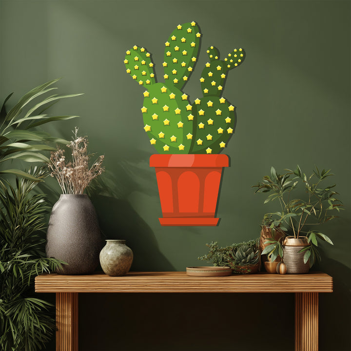 Featuring geometric elements, this unique metal wall art depicts a prickly pear cactus with angular segments and star-shaped details, enhancing modern botanical decor.