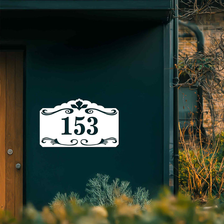 Traditional metal house number plaque exterior wall