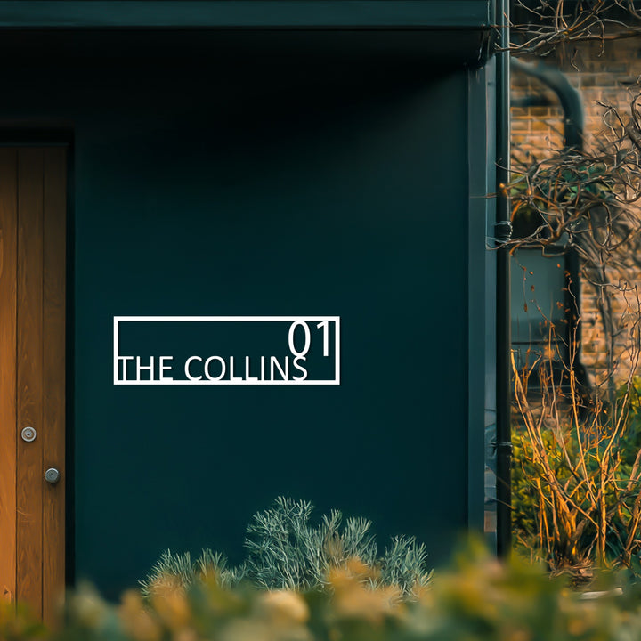 Minimal modern metal family name plaque