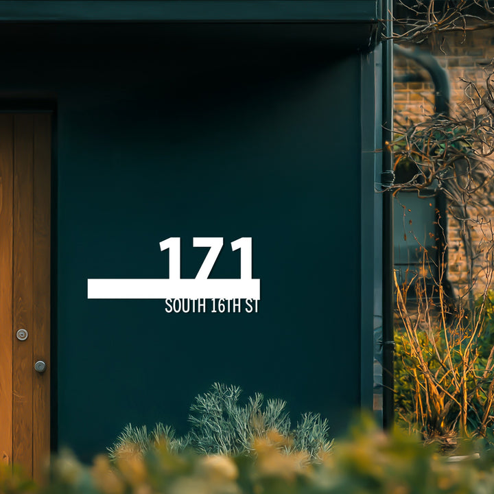 Modern floating metal address sign exterior