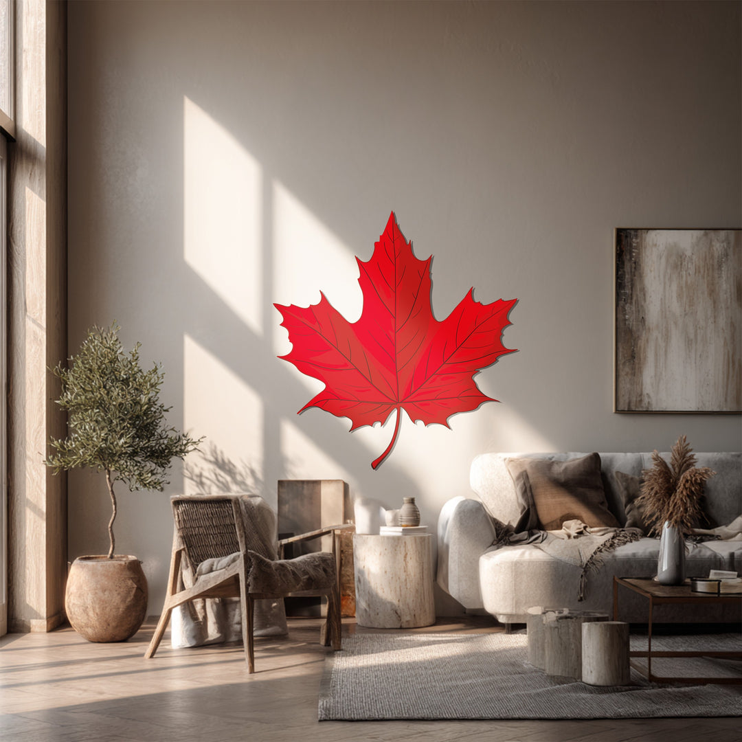The darkest area highlights the bold details and the smooth finish of this striking red maple leaf metal artwork, a captivating piece of Canadian nature-inspired metal artwork.
