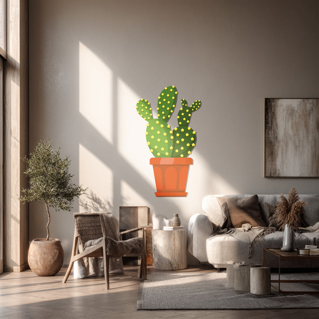 The depth and layers of the room enhance the dimensional qualities of the prickly pear cactus metal artwork, creating a striking piece of metal artwork.