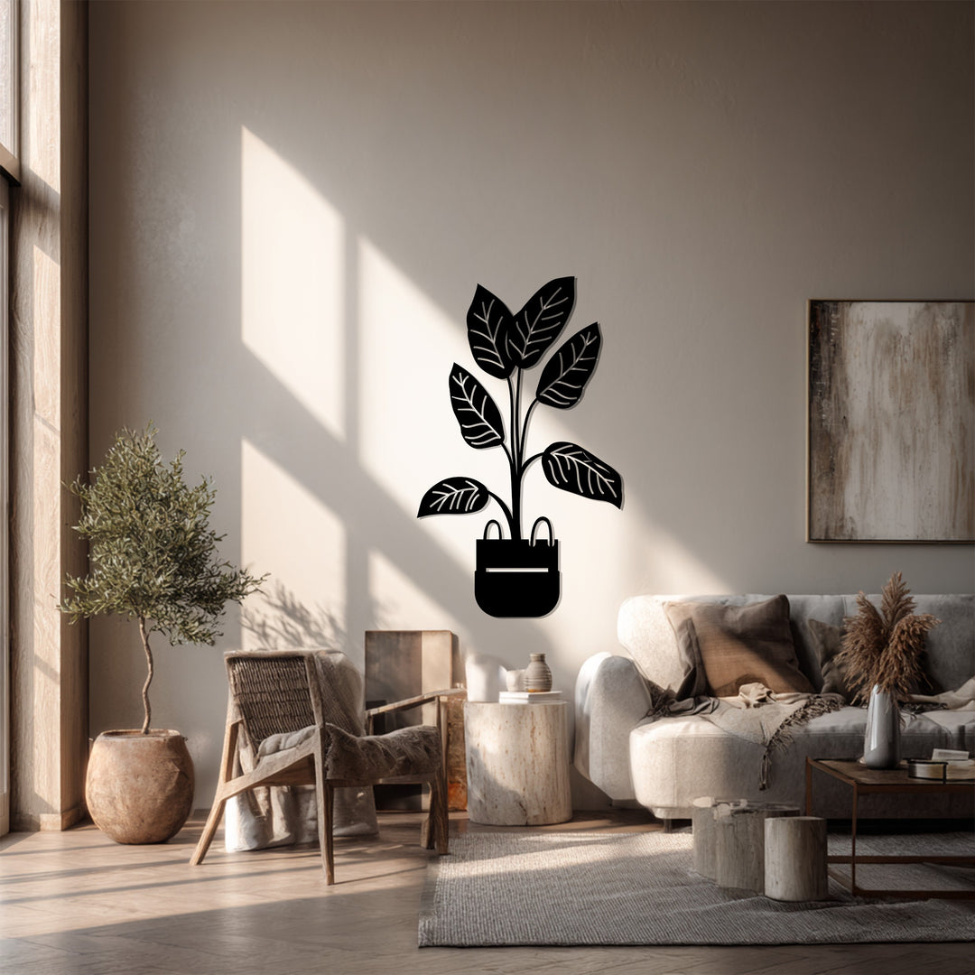 Alternating bands of light and shadow accentuate this modern metal artwork of a potted plant, a botanical minimalist piece with striking dimensionality.