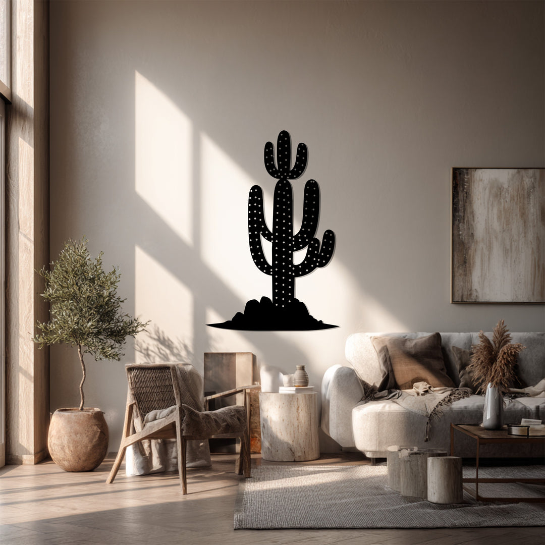 A silhouette of the unique metal wall art, depicting a saguaro cactus design, adds modern desert landscape decor to this boho-chic interior.