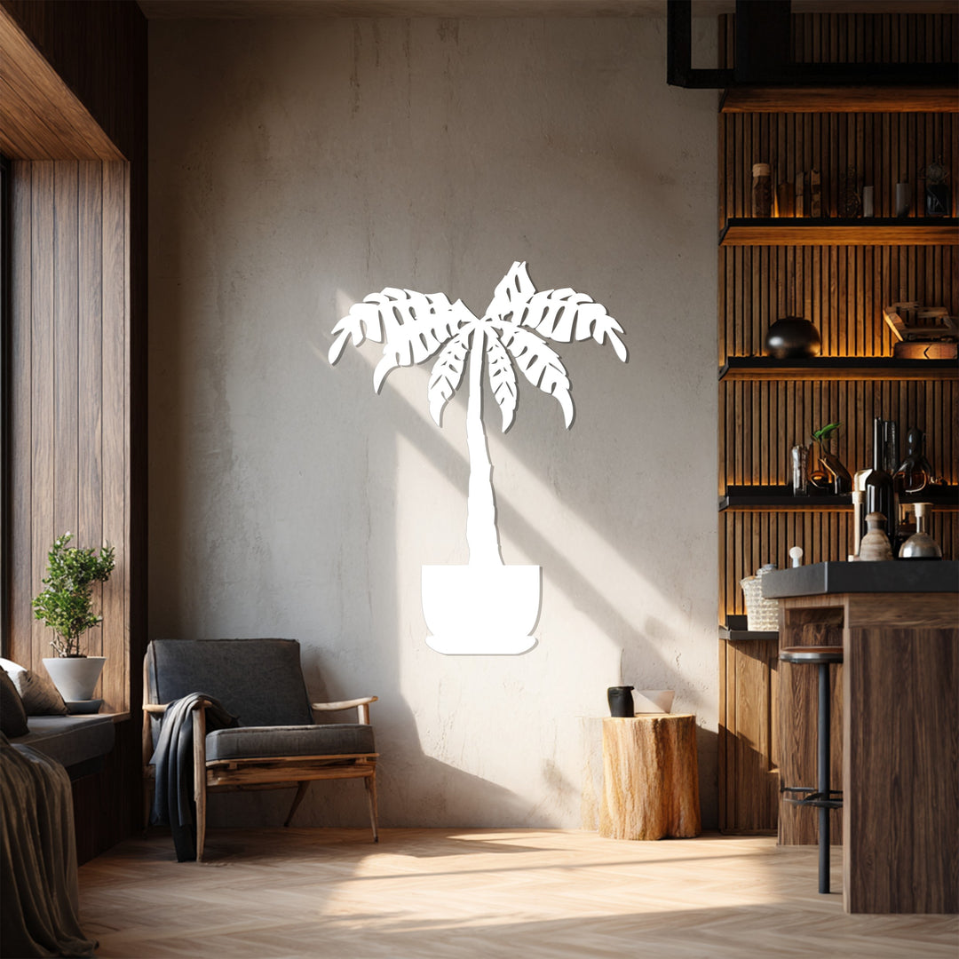 The sleek, white finish accentuates the modern aesthetic of this tropical palm tree metal wall decor, offering a minimalist take on botanical metal wall art.