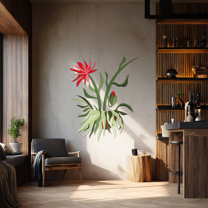 Dominated by reds and greens, a captivating piece of unique metal wall art showcases a blooming red hanging plant, bringing botanical modern decor to life.
