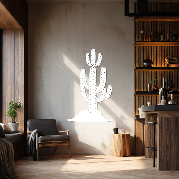 Gloom envelops the upper corner of the modern bar area, contrasting with the decorative metal art of a saguaro cactus that brings desert charm.