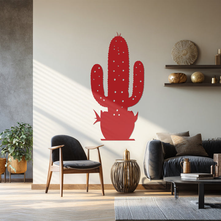 The realistic detail of the cactus metal artwork is showcased by the textured wall and surrounding furniture in this stylishly decorated, contemporary room.