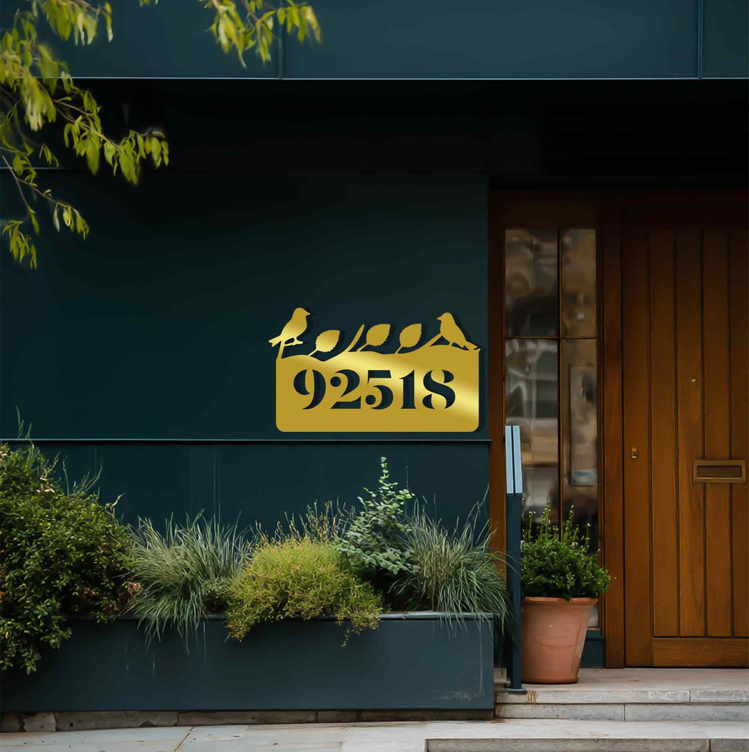 Artistic metal house numbers with bird silhouettes