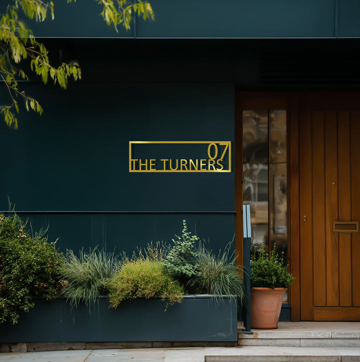 Contemporary framed metal family name wall decor