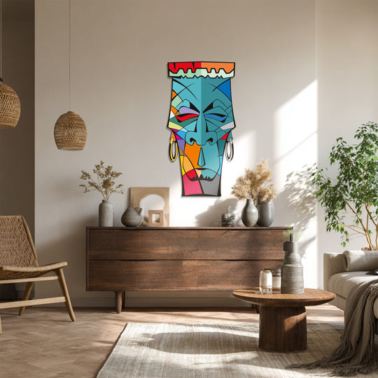 Dramatic light and shadow highlight the tribal abstract face metal artwork, creating depth and dimension in this striking piece of metal artwork.