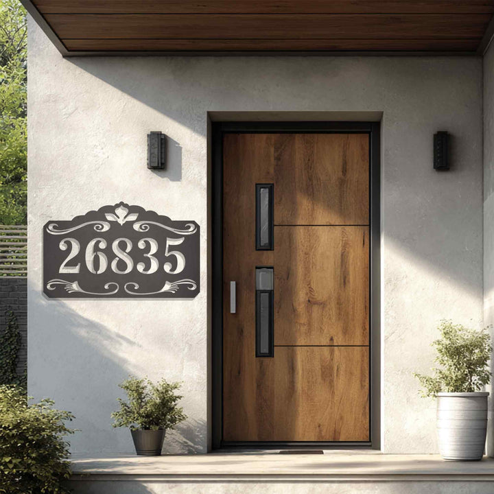 Decorative metal address plaque with scrollwork