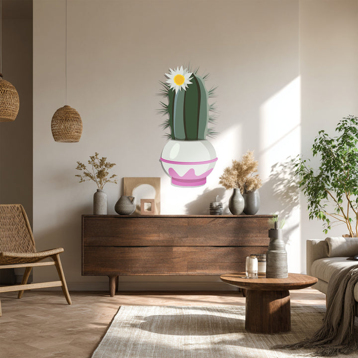 Neutral-toned walls with a sunlit corner create a serene backdrop for the decorative metal art, enhancing the modern botanical charm of the Blossom Crown Cactus.
