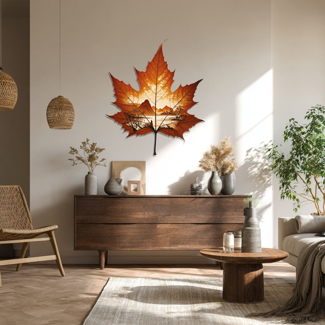 Mounted as the focal point, the decorative metal art of an autumn horizon inside a maple leaf creates a stunning nature landscape wall decor.