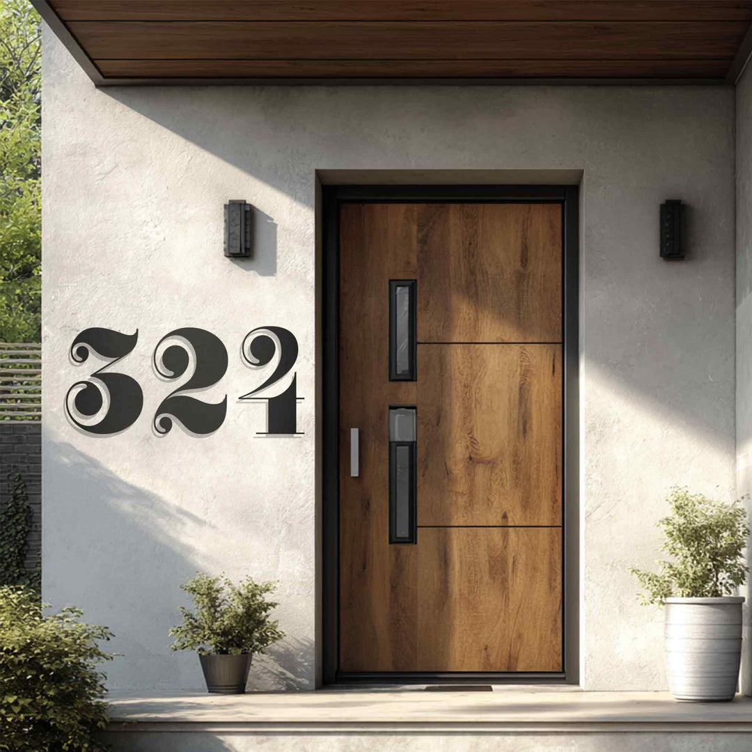 Juxtaposing light and shadow accentuates the color contrast in this metal art for wall showcasing vintage-style house numbers adorning a modern entryway.