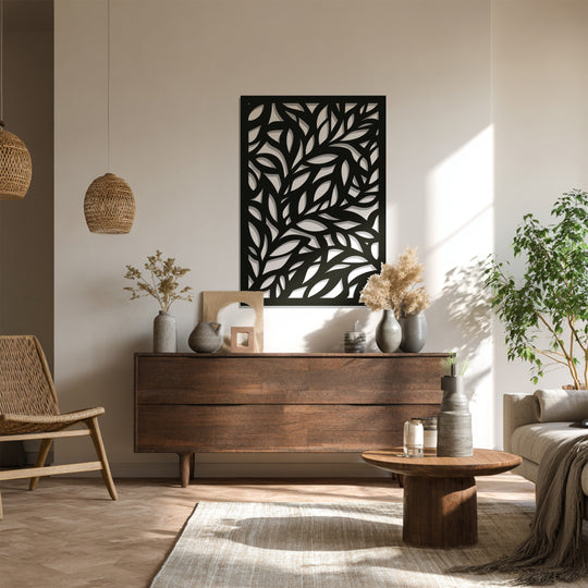 Interwoven leaf shapes create captivating negative space within this black botanical metal art for wall, forming a modern and sculptural leaf panel.