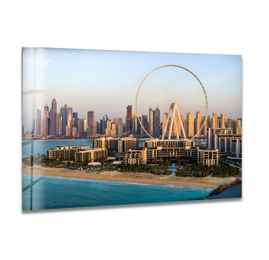 Azure hues dominate this glass wall art, featuring a Dubai skyline and the Ain Dubai Ferris Wheel, a stunning addition among wall prints.