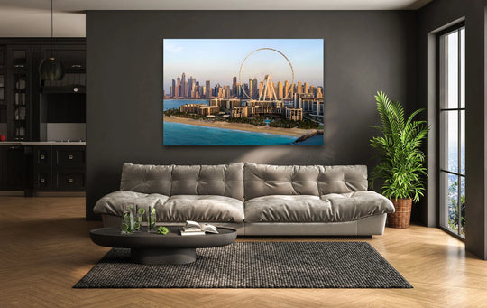 Dramatic color contrast highlights the vibrant blues of the sea against the warm skyline in these Dubai skyline wall art prints.