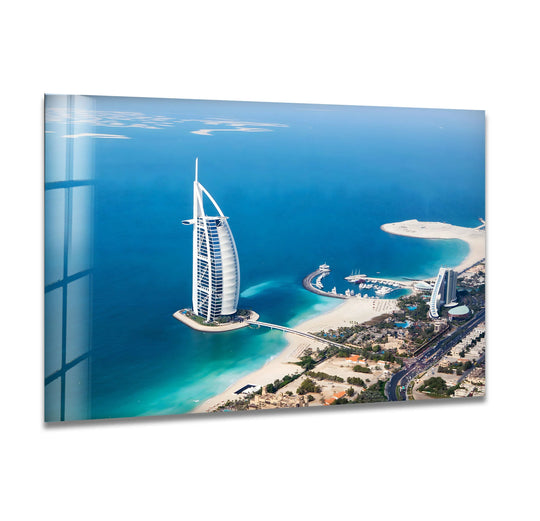 Beachy sand gently slopes into the turquoise gulf in this wall art prints image of the Burj Al Arab Dubai, an iconic luxury hotel.