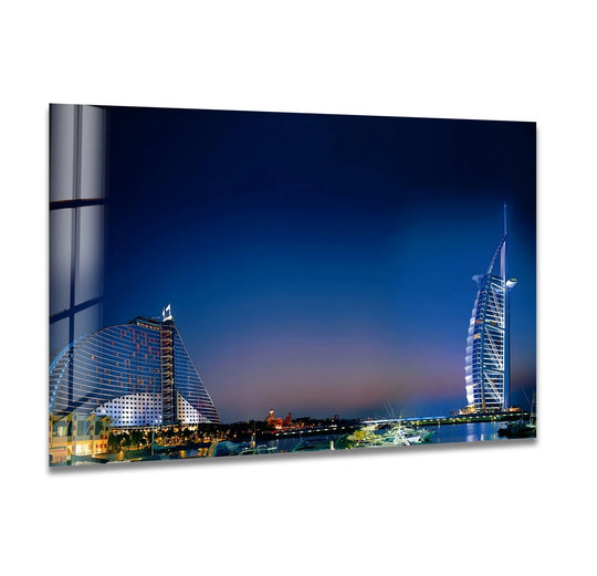 Showcasing cool color temperature, the Burj Al Arab and Jumeirah Beach Hotel are captured at night in a captivating tempered glass wall art, highlighting Dubai's iconic landmarks.