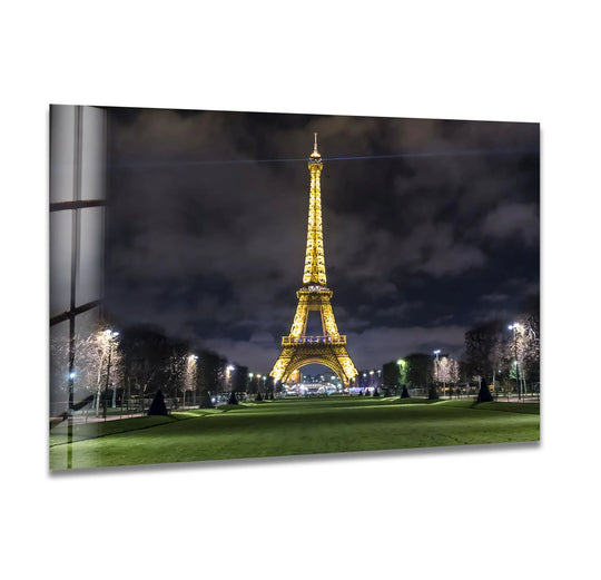 High-quality glass wall artwork showcases the illuminated Eiffel Tower at Night, exemplifying a durable and pristine glass print of the iconic landmark.
