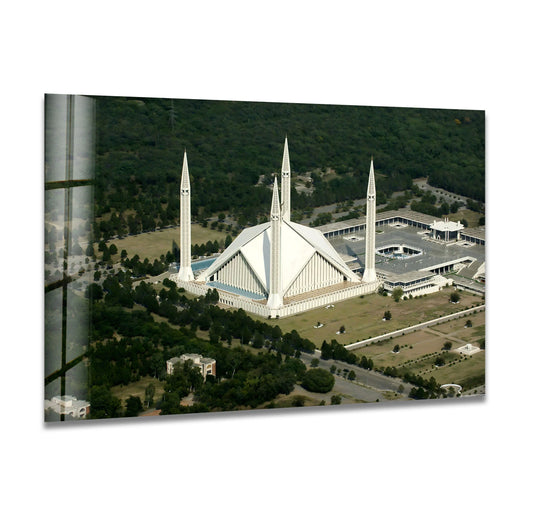 The stillness of the iconic landmark is captured in this aerial view on glass wall art decor, featuring the architectural majesty of Faisal Mosque.
