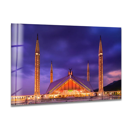 Showcasing the realistic detail, this print wall art depicts the Faisal Mosque's illuminated architecture and minarets against a dramatic night sky.