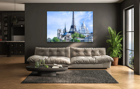 Billowy clouds behind the Eiffel Tower and Sacré-Cœur provide a soft contrast in this glass wall art print, a perfect choice for home decoration.
