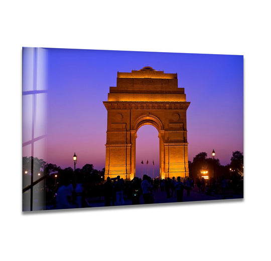 The focal point shows the illuminated India Gate as captivating glass wall art decor, capturing the iconic landmark at dusk.