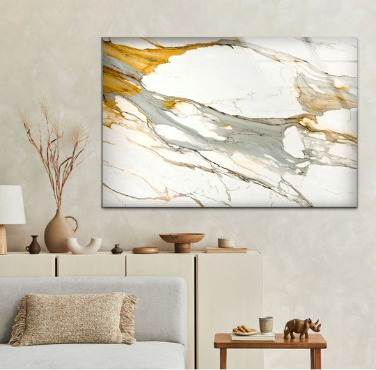 A vibrant white marble glass wall art decor with striking gold and grey veins for dynamic color saturation.