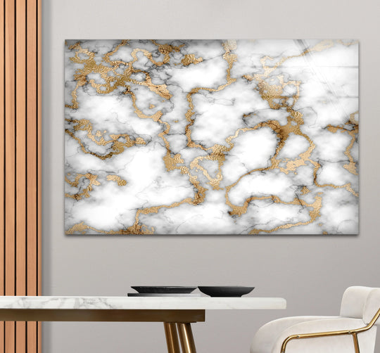 Deepest charcoal veins interlace the luxurious white and gold marble glass wall art.