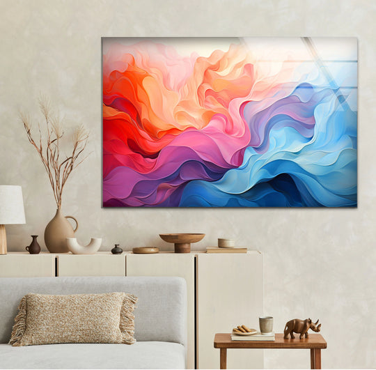 Vibrant, highly saturated abstract glass wall art displays a fluid dance of intense crimson, vivid magenta, and bright azure hues.