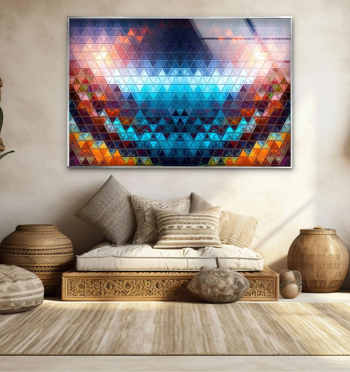 The glossy finish of the geometric prism glass wall art enhances its unique modern wall decor, displaying a colorful triangle mosaic in brilliant detail.