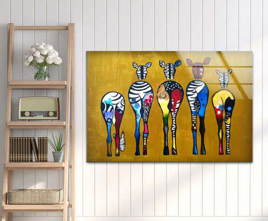 Abstract safari animal glass wall artwork features vibrant, colorful zebras with bold, playful patterns.