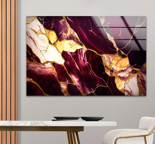 A rectangular burgundy and gold abstract marble glass printing showcasing organic shapes and intricate veins.