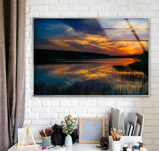 Rectangular serene lake glass wall artwork featuring a tranquil sunset reflection creates a dynamic geometric composition with the brick wall and desk arrangement.
